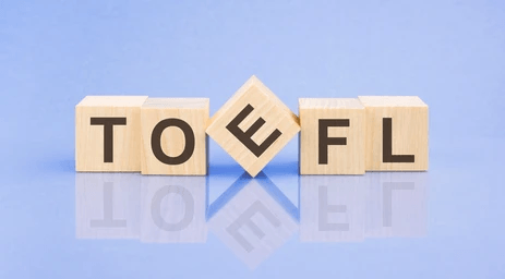 دوره تخصصی TOEFL 3 toefl word written on wooden 260nw 2146095663 copy